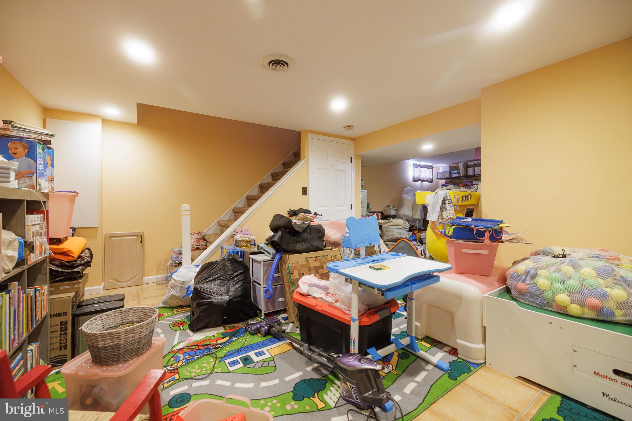 3022 Oak Drive Sinking Spring, PA 19608 - Photo 21 of 28 a bed room with furniture and a flat screen tv