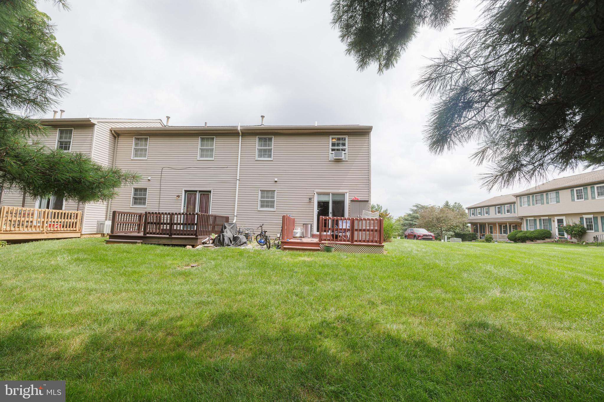 3022 Oak Drive Sinking Spring, PA 19608 - Photo 25 of 28 a view of a house with backyard sitting area and garden