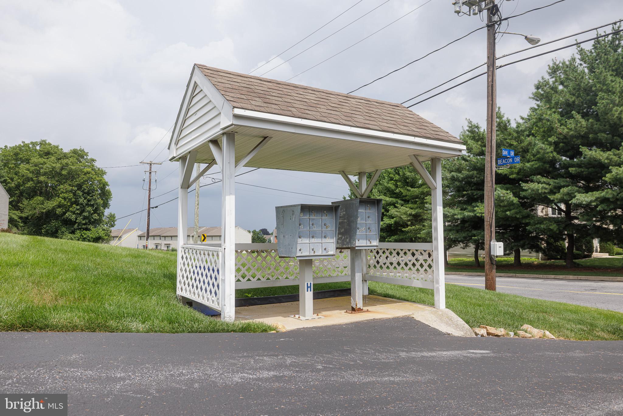 3022 Oak Drive Sinking Spring, PA 19608 - Photo 28 of 28 a view of a house with a yard and table and chair