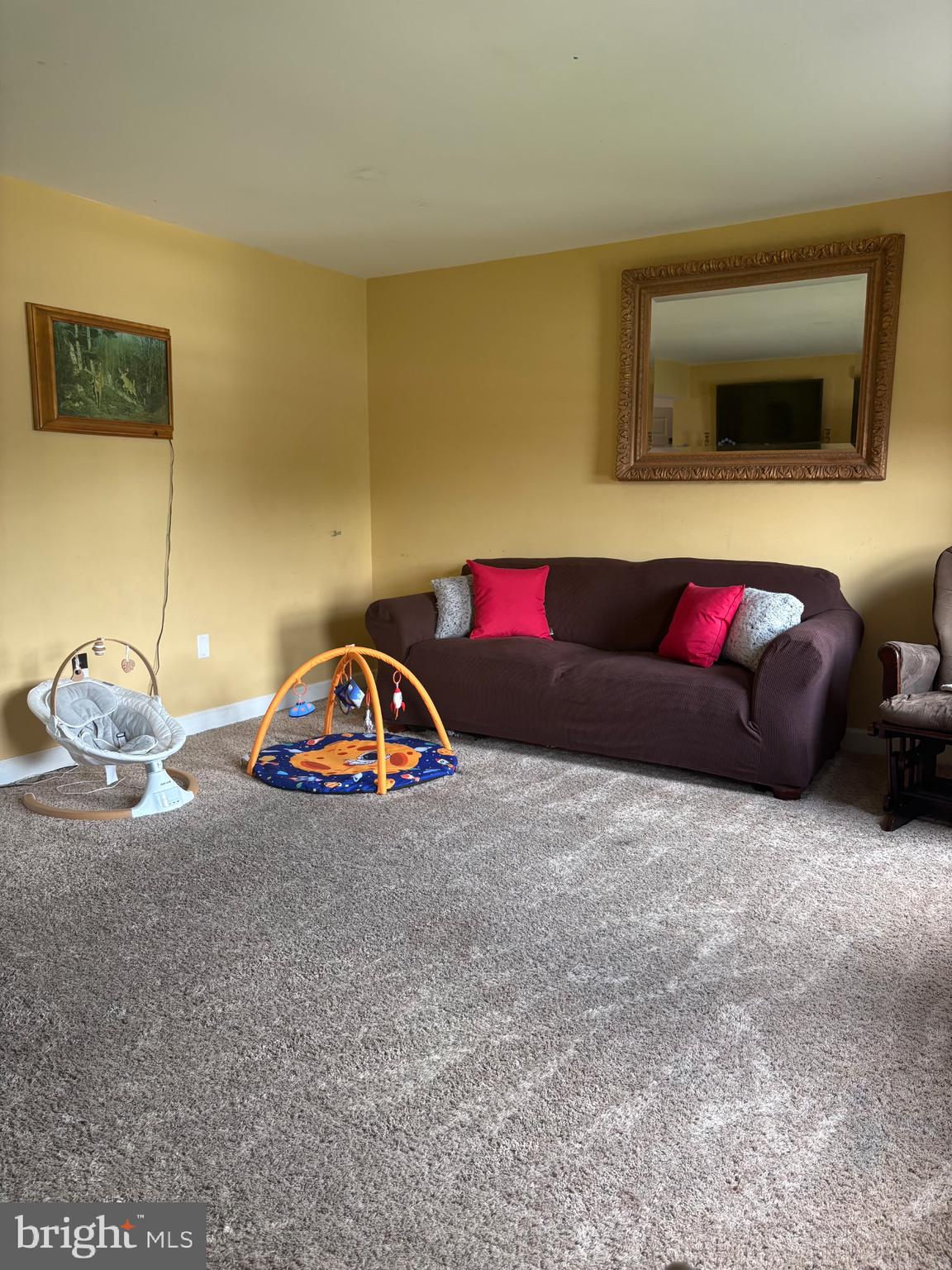 3022 Oak Drive Sinking Spring, PA 19608 - Photo 6 of 28 a living room with furniture and a flat screen tv