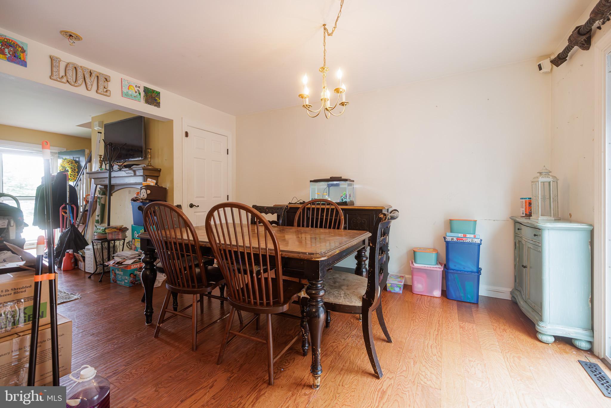 3022 Oak Drive Sinking Spring, PA 19608 - Photo 7 of 28 a view of a dining room with furniture and wooden floor