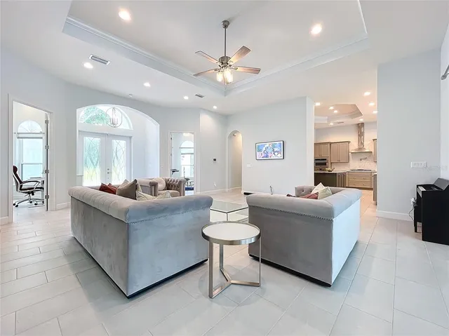 a view of a house with backyard and porch