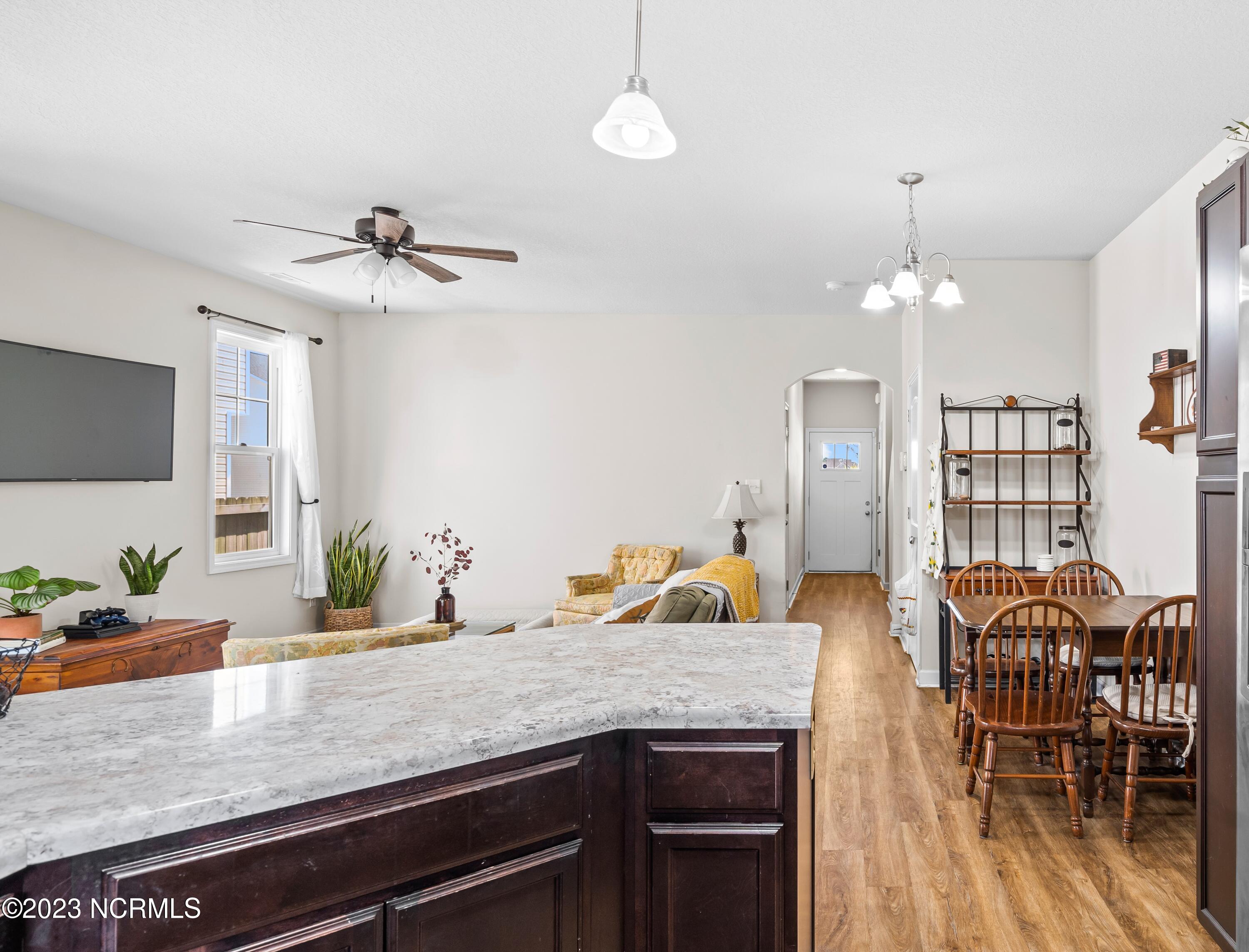 387 Frisco Way Holly Ridge, NC 28445 - Photo 15 of 37 Kitchen View to Living Room