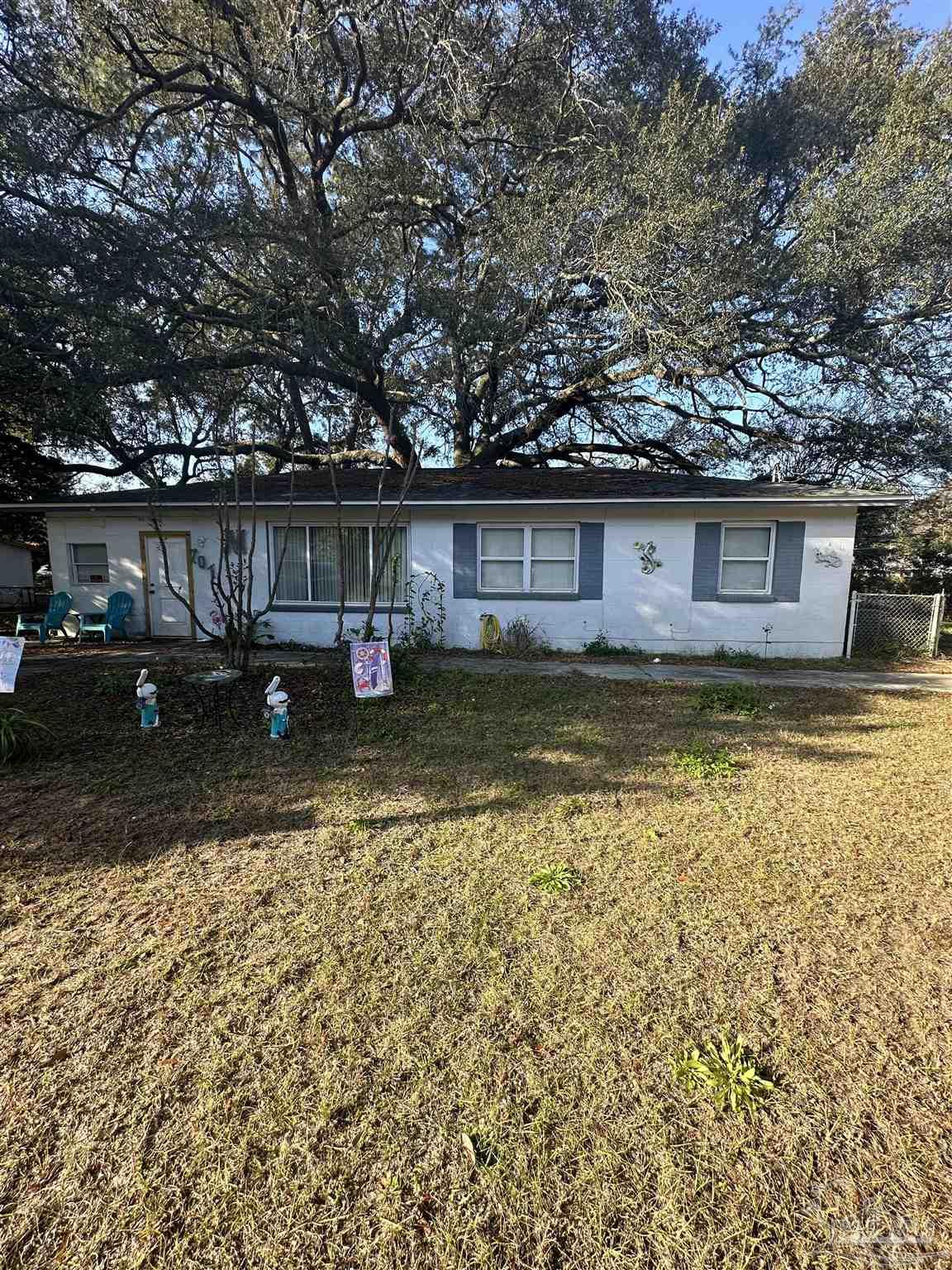 front view of a house with a yard