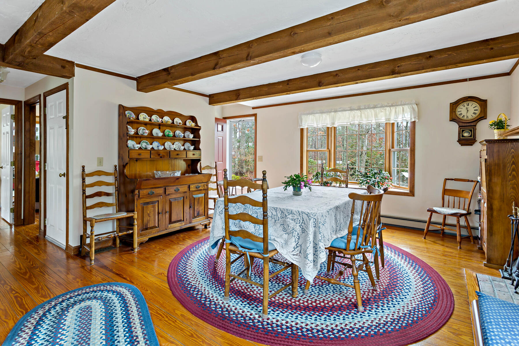 204 Farmersville Road Sandwich, MA 02563 - Photo 4 of 26 a living room with furniture and a table