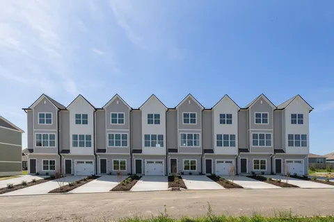 a front view of a building with street view