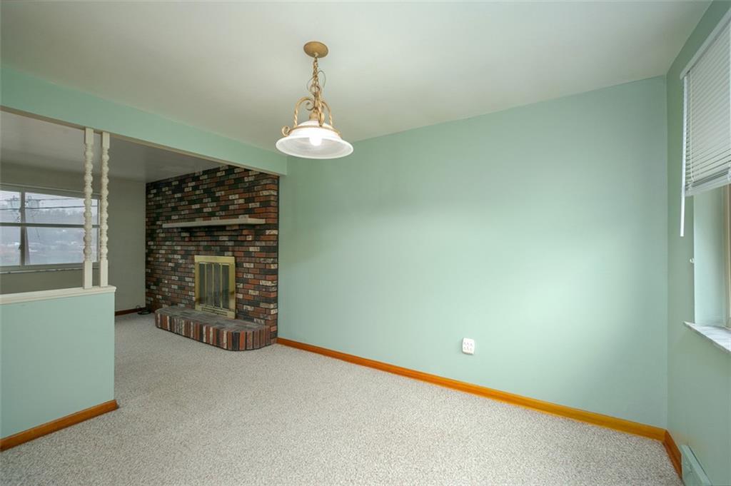 1870 Haymaker Road Monroeville, PA 15146 - Photo 11 of 20 a view of a livingroom with a fireplace