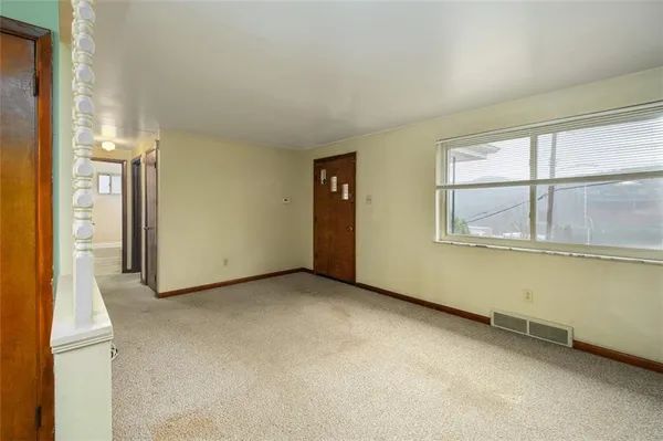 an empty room with window