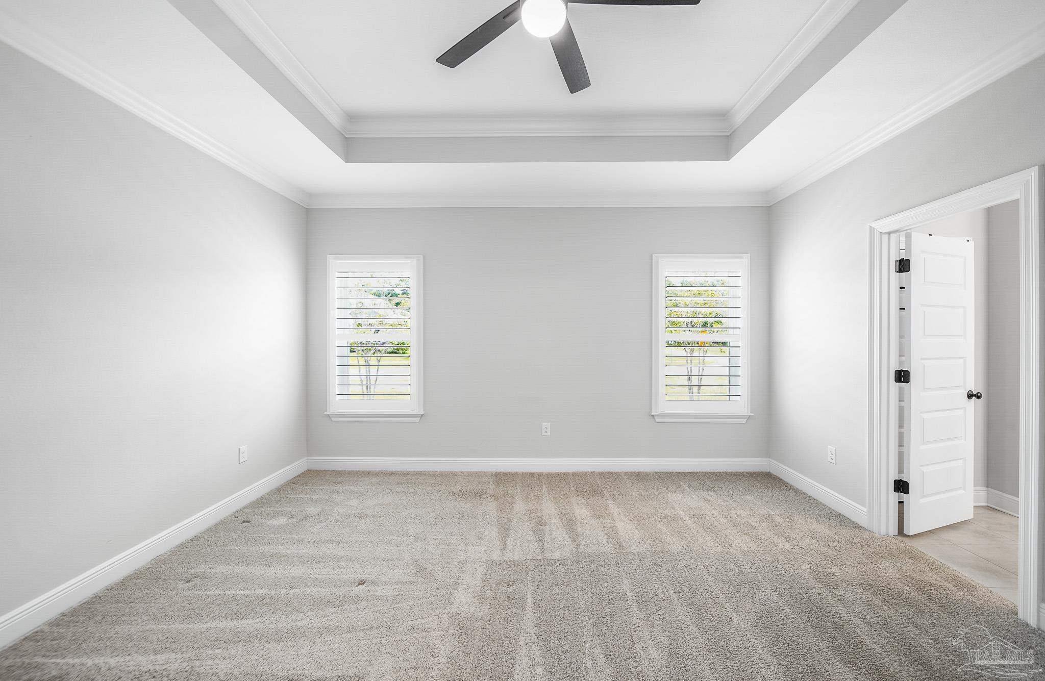 8977 Eureka Street Milton, FL 32583 - Photo 23 of 44 wooden floor in an empty room with a window