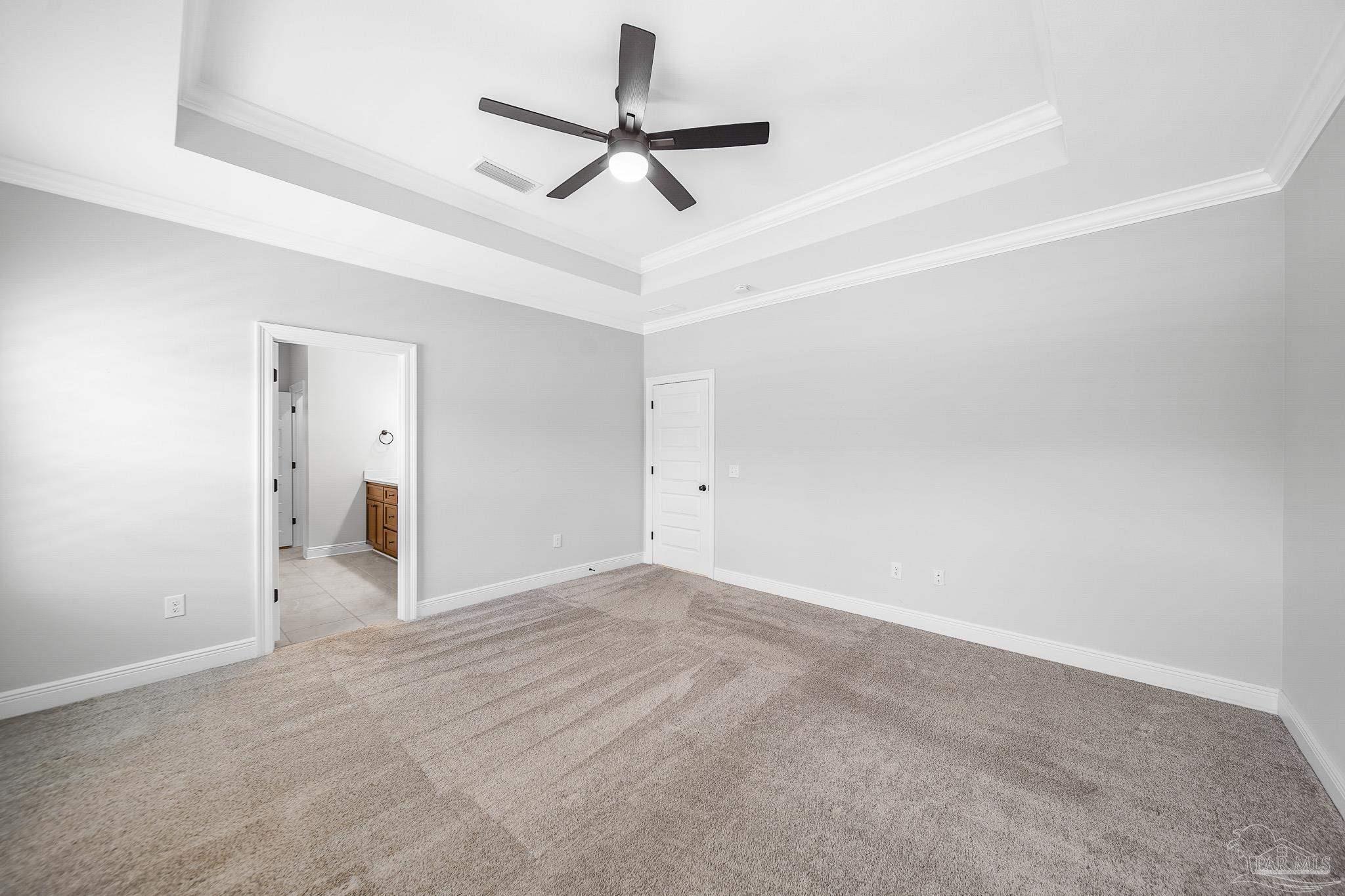 8977 Eureka Street Milton, FL 32583 - Photo 24 of 44 an empty room with a ceiling fan and window