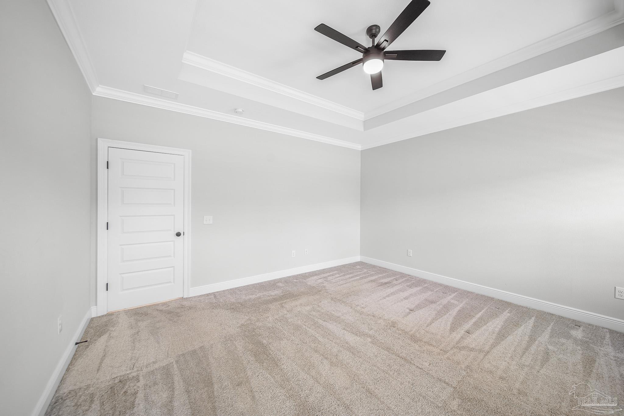 8977 Eureka Street Milton, FL 32583 - Photo 25 of 44 an empty room with a ceiling fan and wooden floor