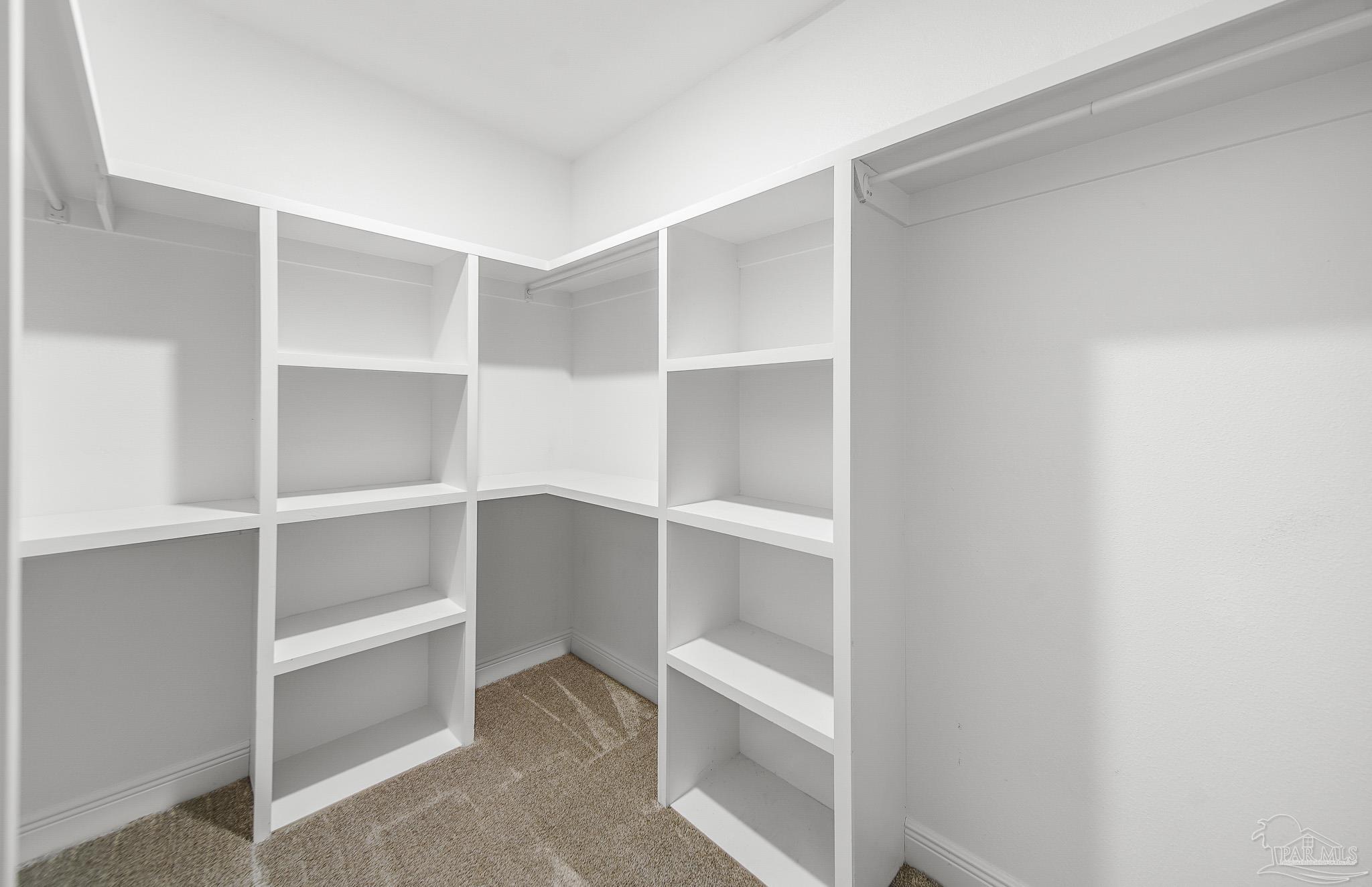 8977 Eureka Street Milton, FL 32583 - Photo 30 of 44 a view of an empty walk in closet