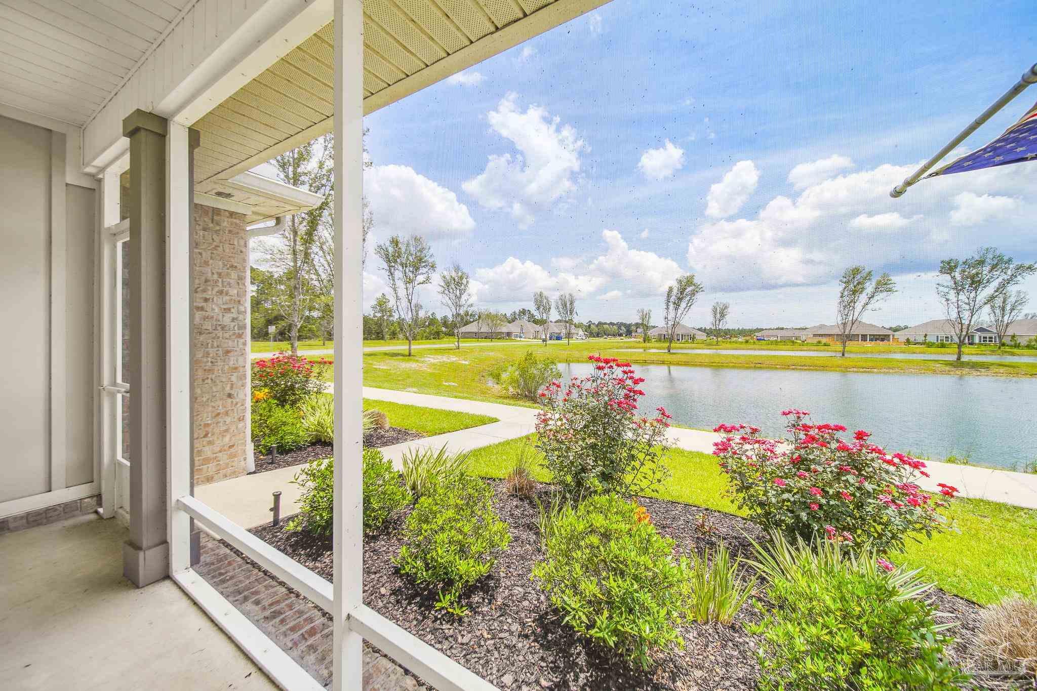 8977 Eureka Street Milton, FL 32583 - Photo 31 of 44 a view of swimming pool with an outdoor seating