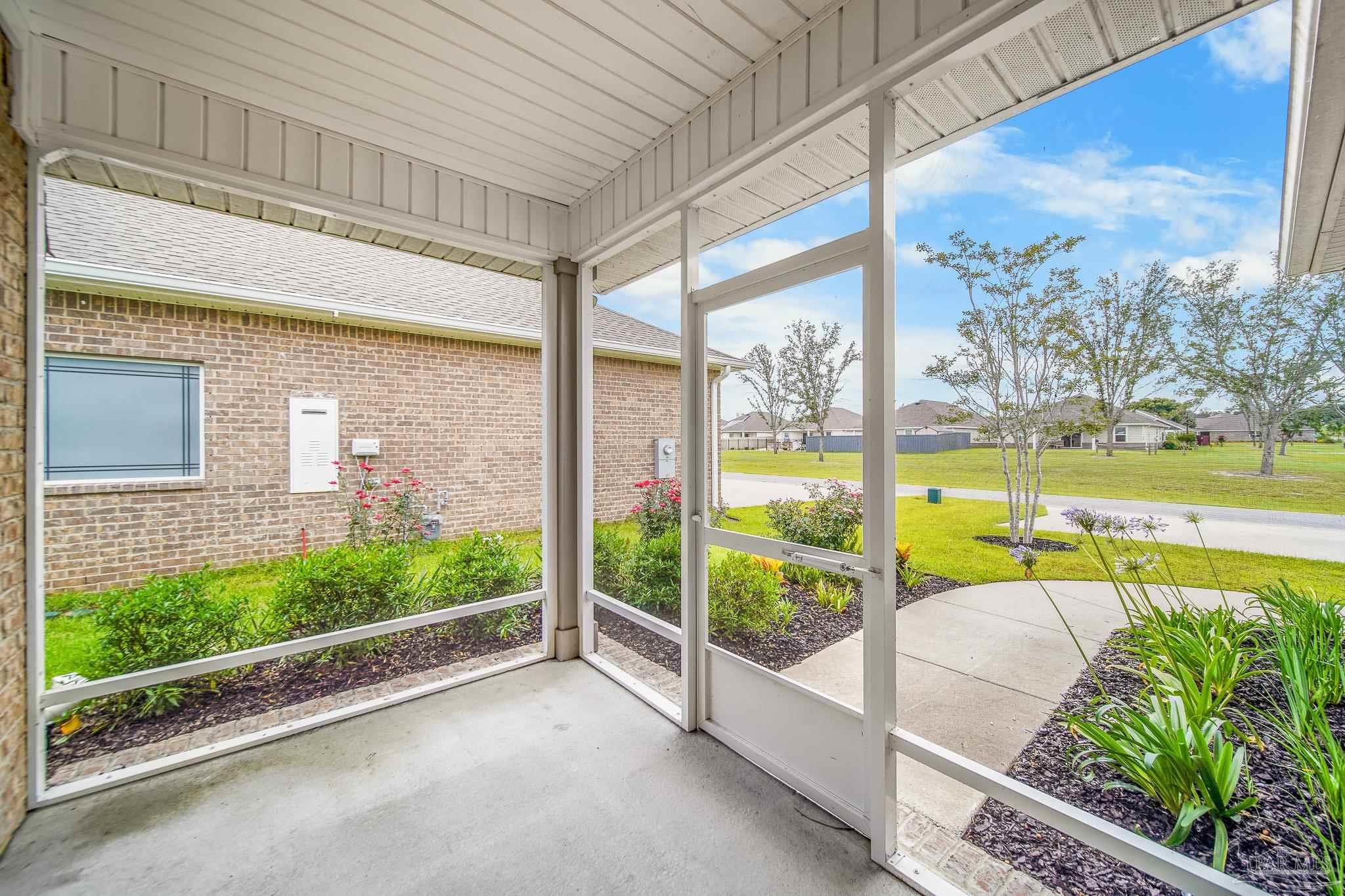 8977 Eureka Street Milton, FL 32583 - Photo 32 of 44 a view of a swimming pool and outdoor space