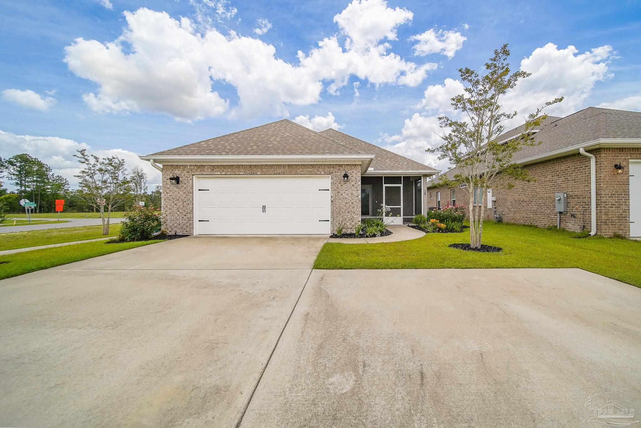 8977 Eureka Street Milton, FL 32583 - Photo 39 of 44 a view of a house with a yard
