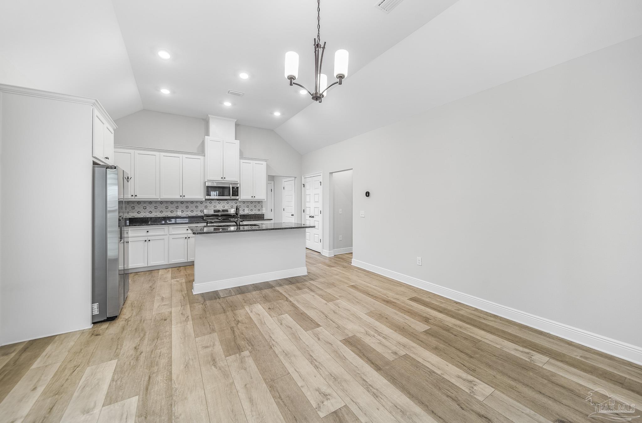 8977 Eureka Street Milton, FL 32583 - Photo 10 of 44 a view of kitchen with sink and refrigerator