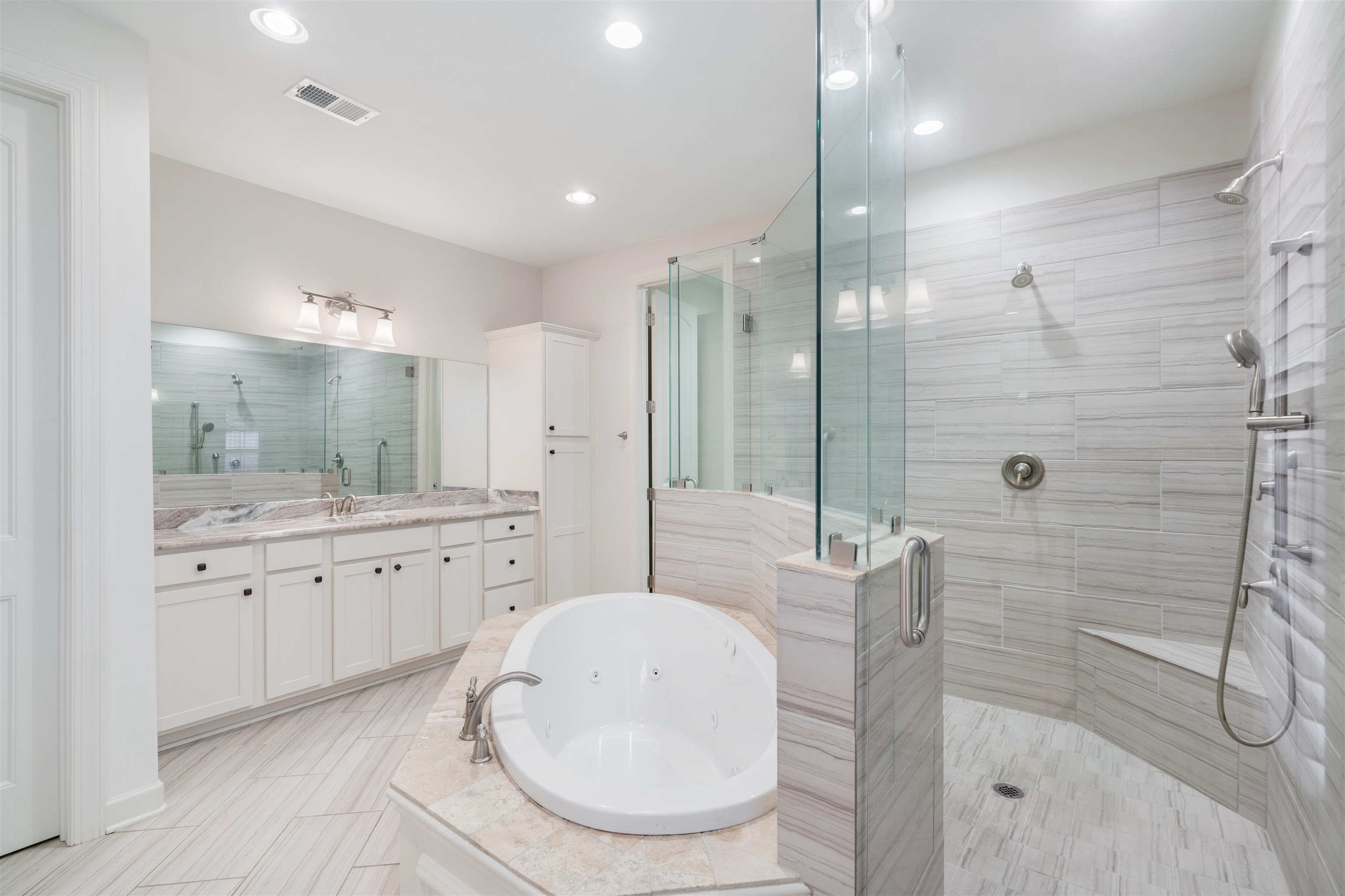 4713 Emmas Circle West Collierville, TN 38017 - Photo 13 of 28 a bathroom with a granite countertop sink mirror and shower