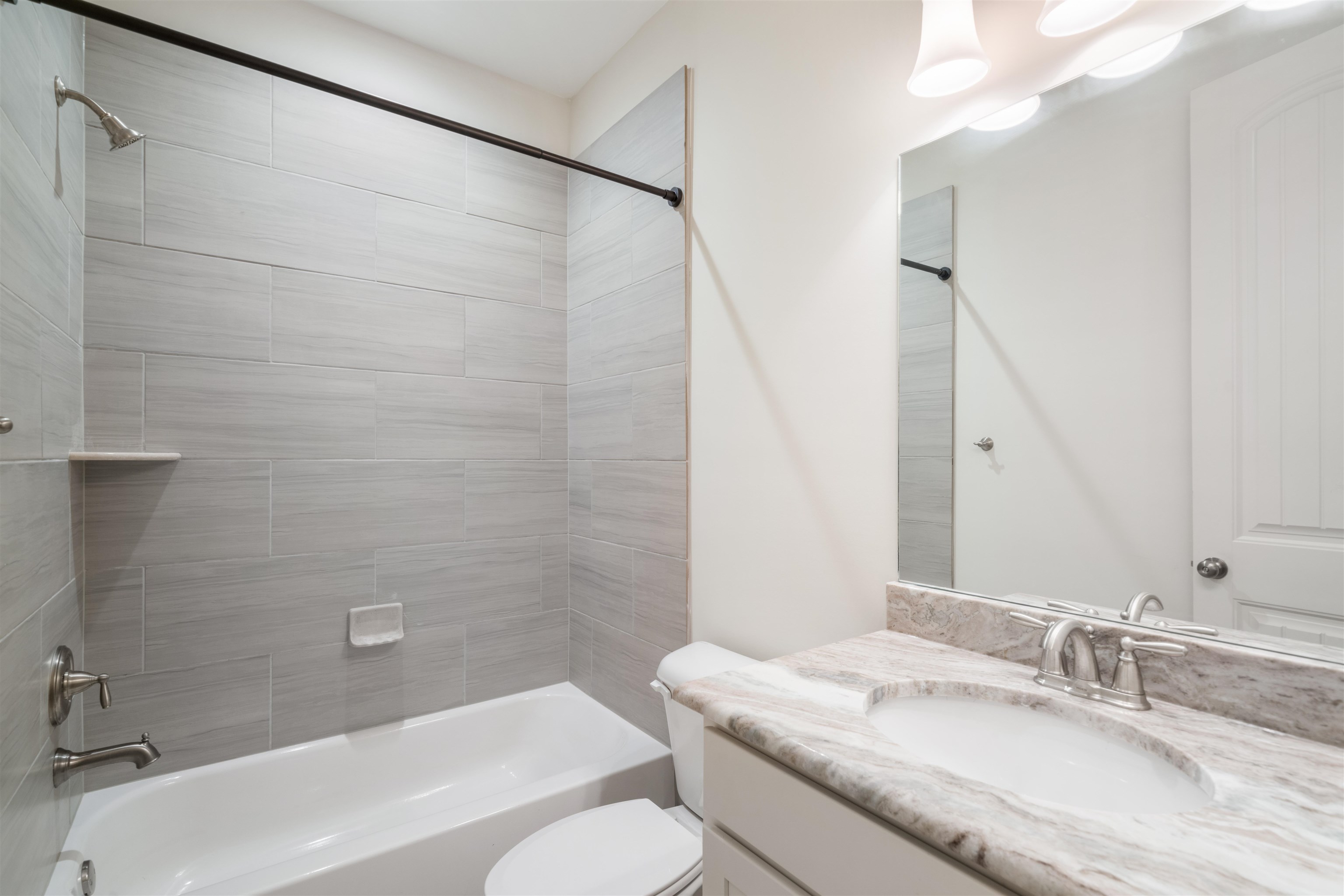 4713 Emmas Circle West Collierville, TN 38017 - Photo 18 of 28 a bathroom with a granite countertop sink toilet and shower