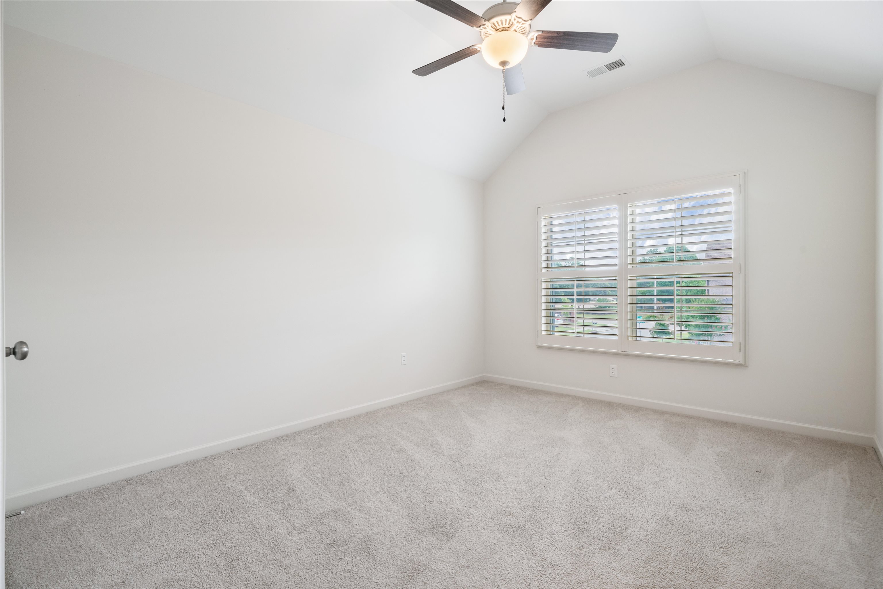 4713 Emmas Circle West Collierville, TN 38017 - Photo 20 of 28 an empty room with a window and a fan