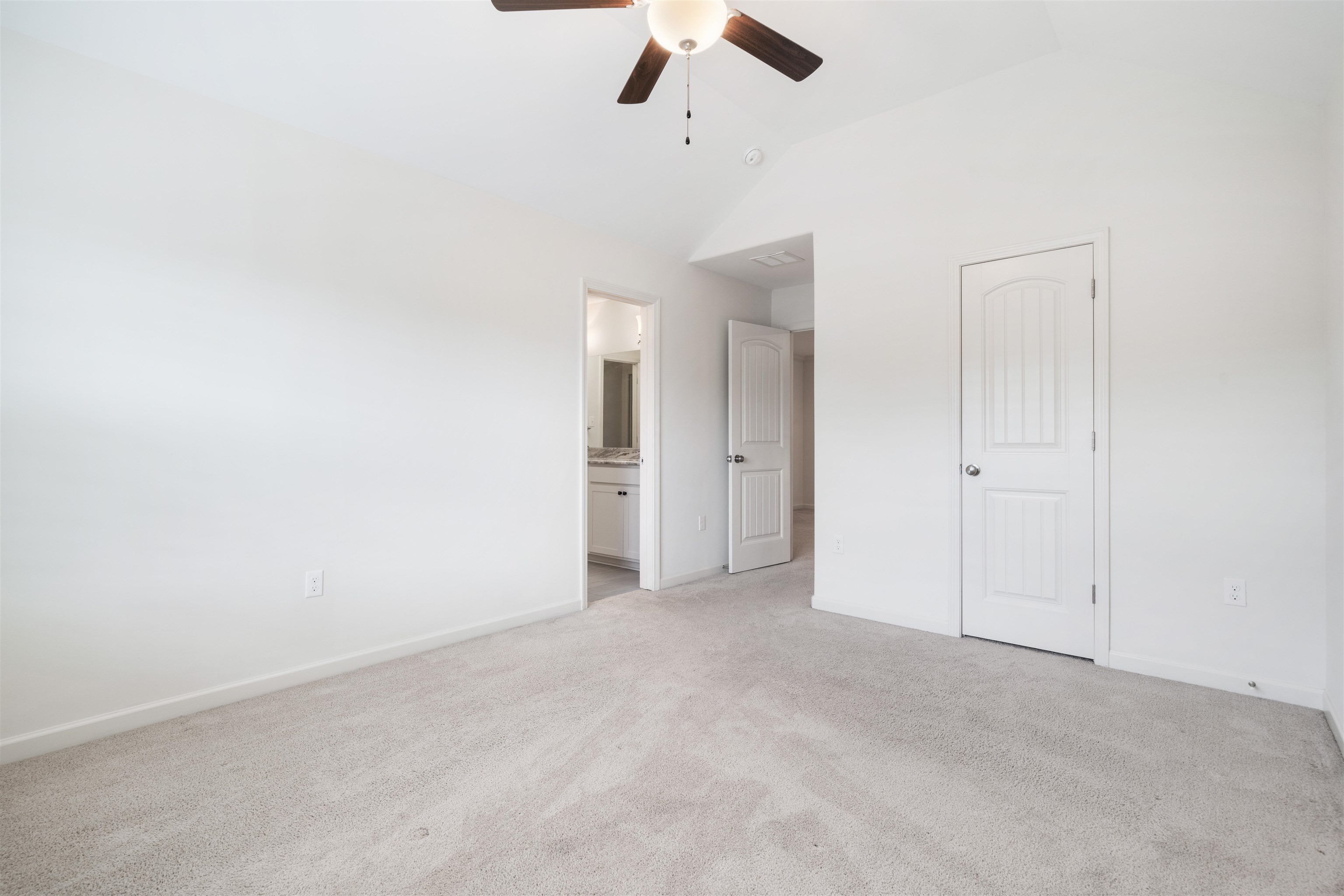 4713 Emmas Circle West Collierville, TN 38017 - Photo 21 of 28 an empty room with a ceiling fan and carpet