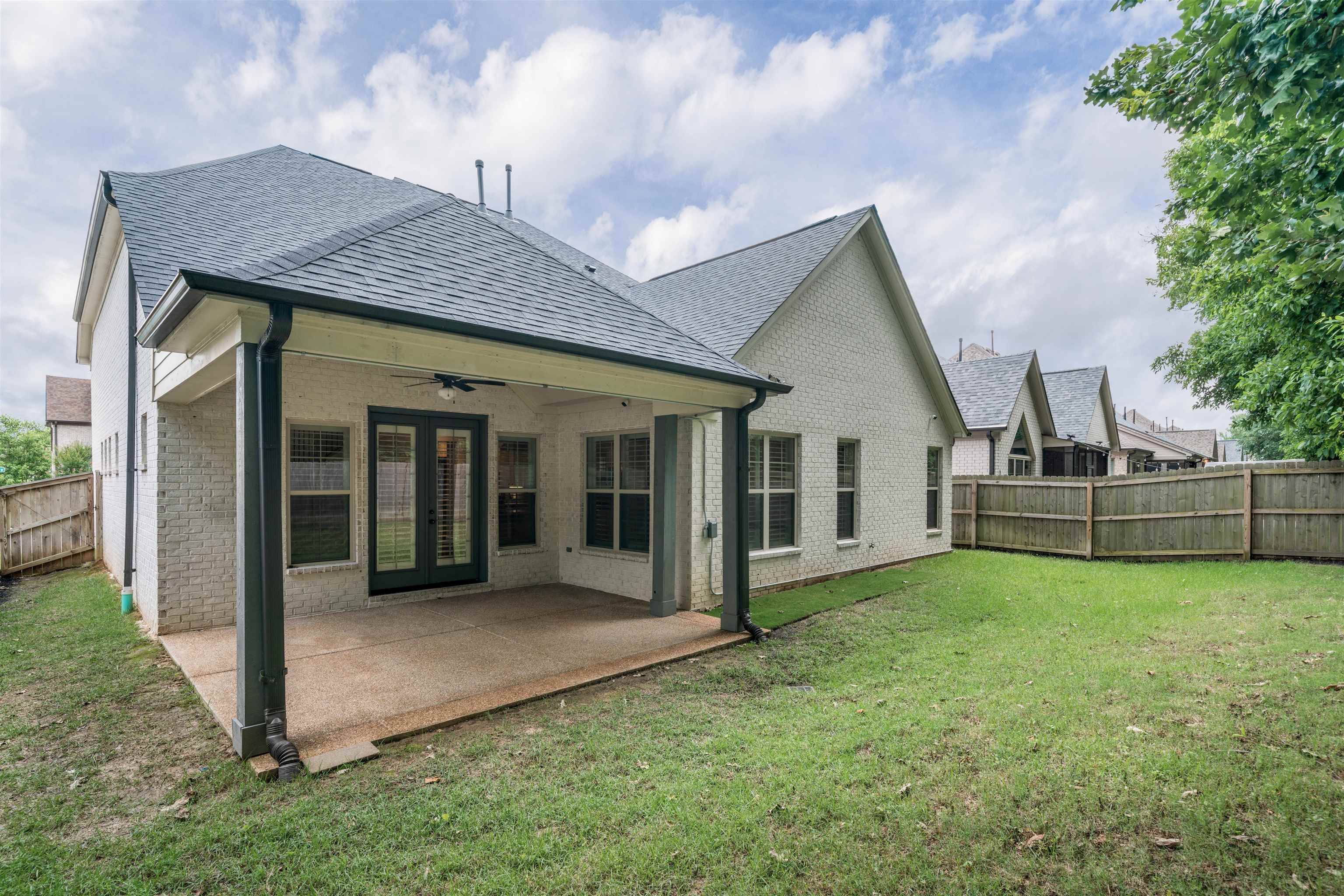 4713 Emmas Circle West Collierville, TN 38017 - Photo 26 of 28 a view of a house with backyard and porch
