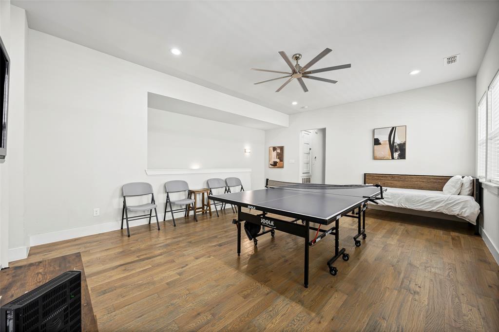 2011 North Prairie Avenue, Unit 2011 Dallas, TX 75204 - Photo 17 of 39 a living room with furniture wooden floor and a table