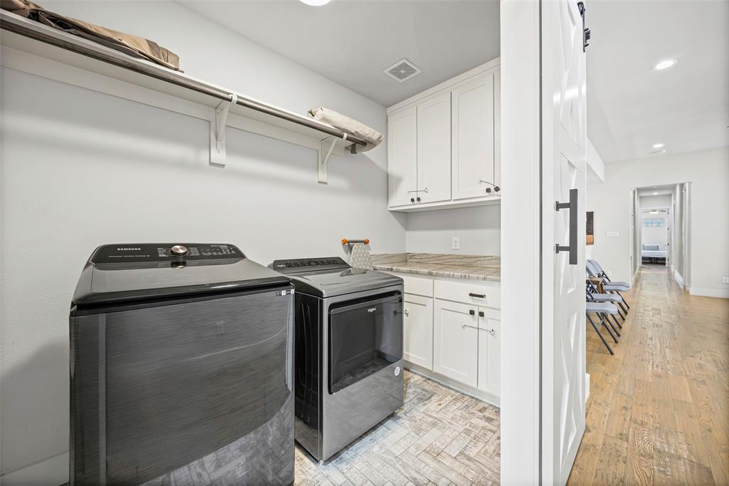 2011 North Prairie Avenue, Unit 2011 Dallas, TX 75204 - Photo 18 of 39 a view of a storage and utility room in kitchen