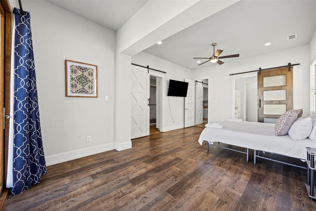 2011 North Prairie Avenue, Unit 2011 Dallas, TX 75204 - Photo 20 of 39 a living room with furniture and a wooden floor