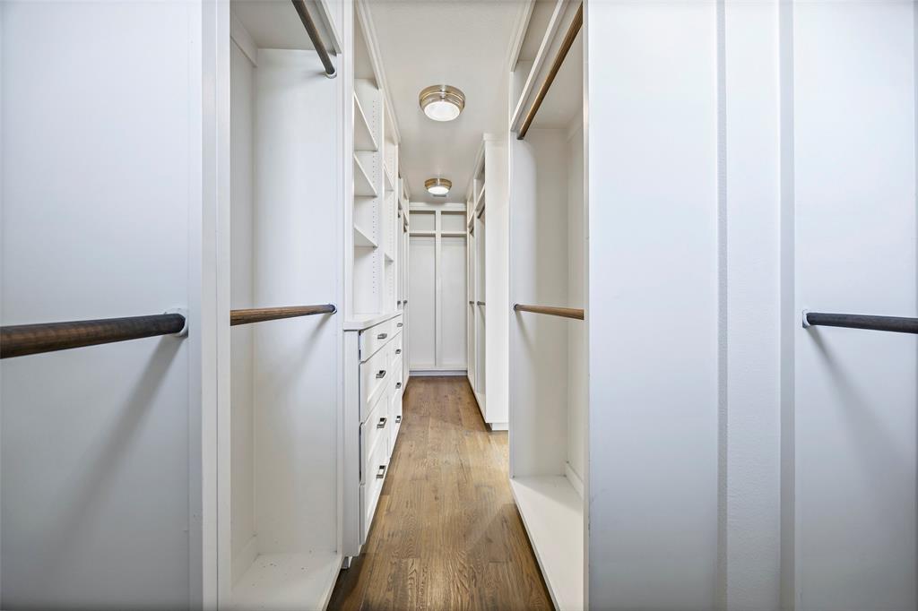 2011 North Prairie Avenue, Unit 2011 Dallas, TX 75204 - Photo 25 of 39 a view of a hallway with wooden floor and staircase