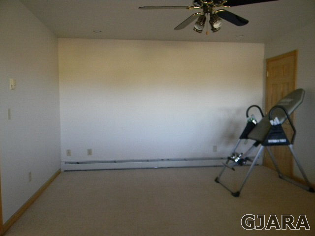 391 Butte Court Grand Junction, CO 81507 - Photo 7 of 11 a view of a room with air conditioner and window