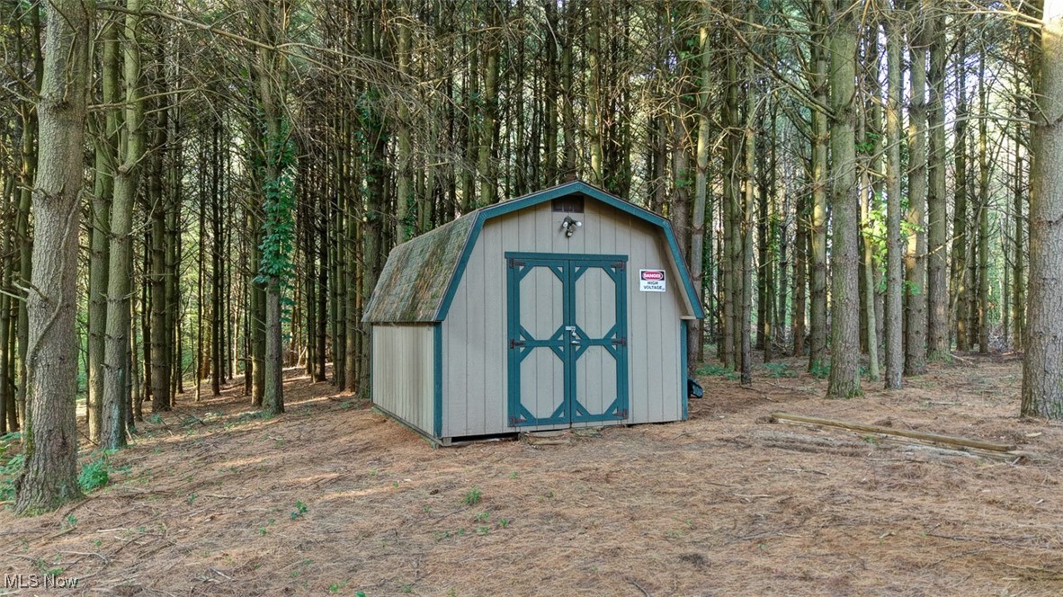 Green Road Tippecanoe, OH 44699 - Photo 18 of 50 View of shed featuring a forest view