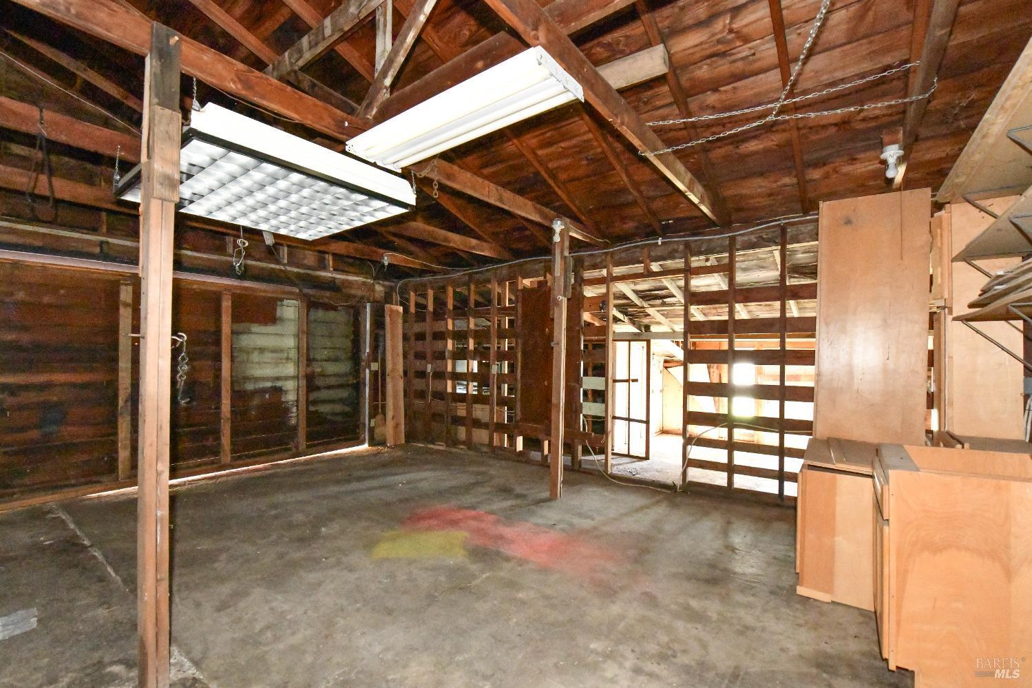 473 Newton Way Angwin, CA 94508 - Photo 77 of 87 A large garage/workshop of +/-1,565 sq. ft. with sliding barn doors plus storage sheds add further value.