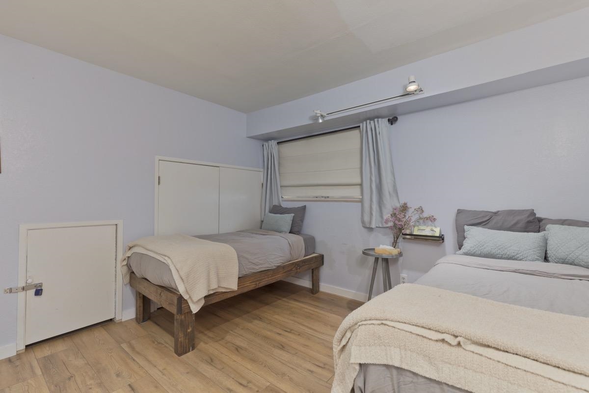 4 Kelley Road, Unit 5 Mammoth Lakes, CA 93546 - Photo 23 of 30 a bedroom with a bed and window