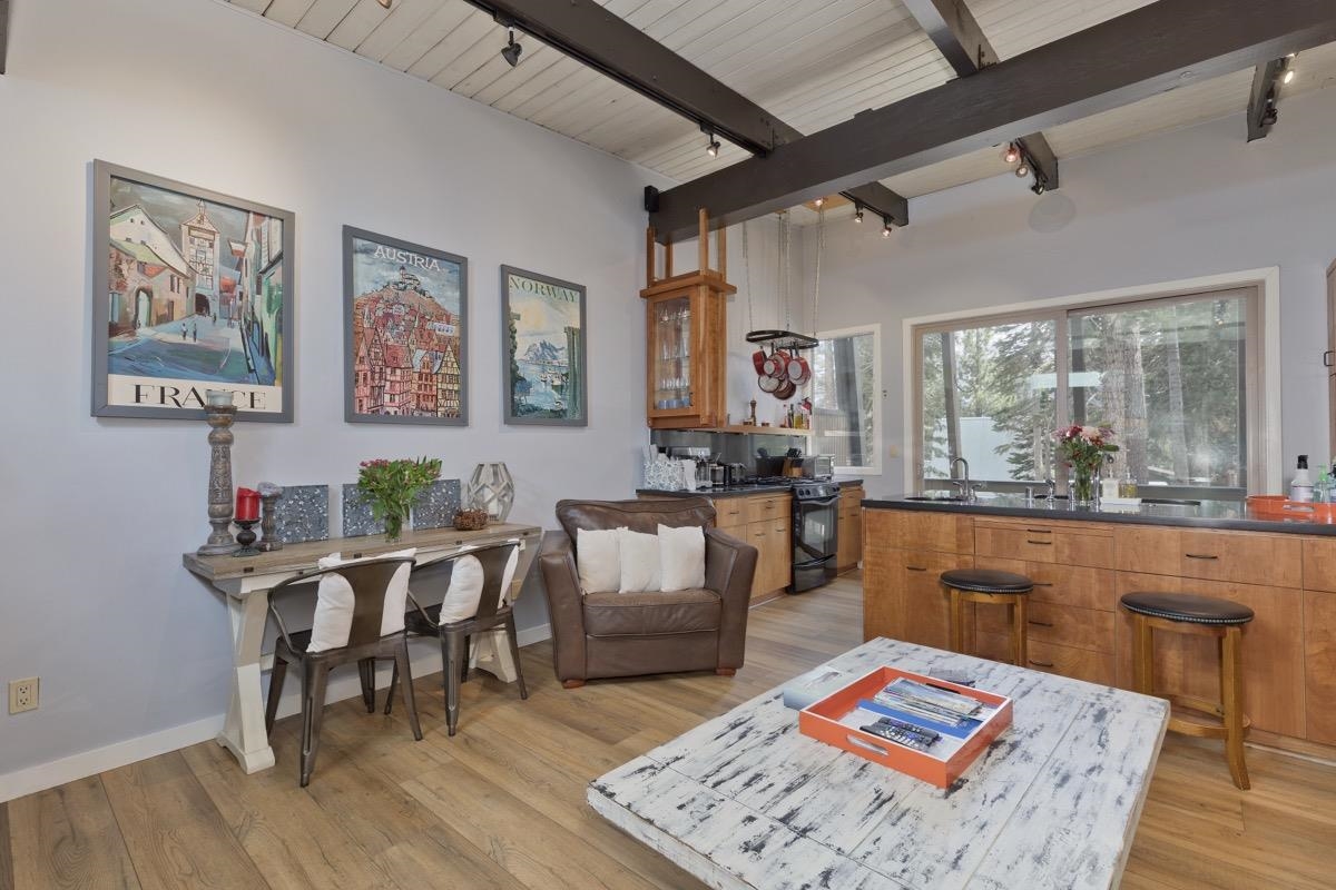4 Kelley Road, Unit 5 Mammoth Lakes, CA 93546 - Photo 3 of 30 a living room with furniture and a wooden floor