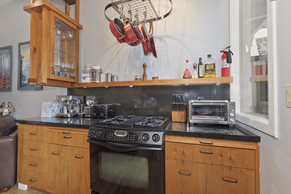4 Kelley Road, Unit 5 Mammoth Lakes, CA 93546 - Photo 8 of 30 a kitchen with stainless steel appliances granite countertop a stove and a sink