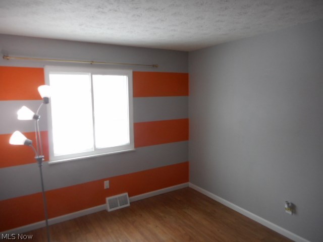 6474 State Road, Unit 6 Parma, OH 44134 - Photo 13 of 18 Bedroom 3. Vinyl, plank flooring.