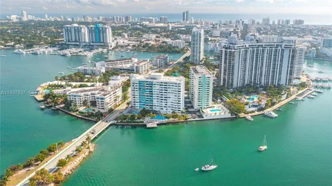 a view of a lake with a large bridge