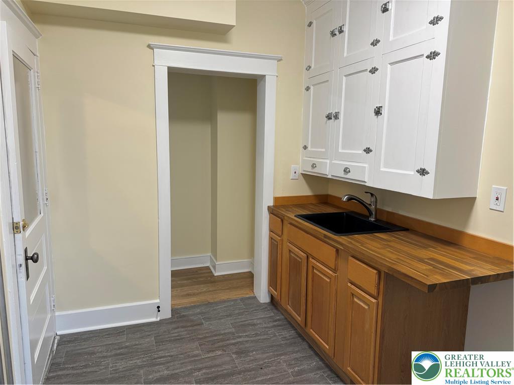 149 South Main Street Nazareth, PA 18064 - Photo 5 of 9 a kitchen with stainless steel appliances granite countertop a sink and a refrigerator
