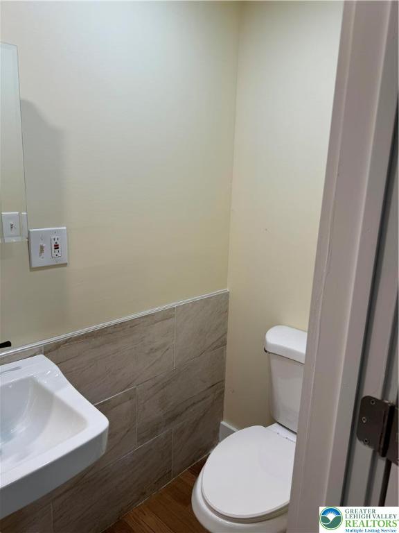 149 South Main Street Nazareth, PA 18064 - Photo 6 of 9 a white toilet sitting next to a white sink