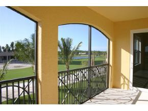 1281 Rialto Way, Unit 201 Naples, FL 34114 - Photo 4 of 6 a view of a porch with a yard