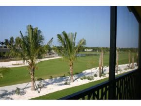 1281 Rialto Way, Unit 201 Naples, FL 34114 - Photo 5 of 6 a view of a lake from a balcony