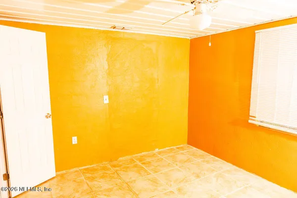 a view of a big room with wooden floor