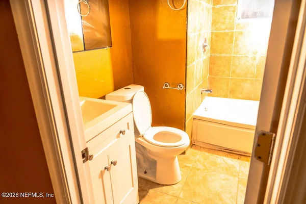 a bathroom with a sink and a toilet