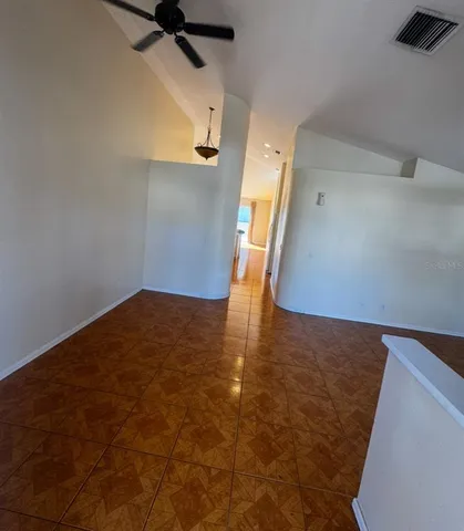 a view of a big room with wooden floor