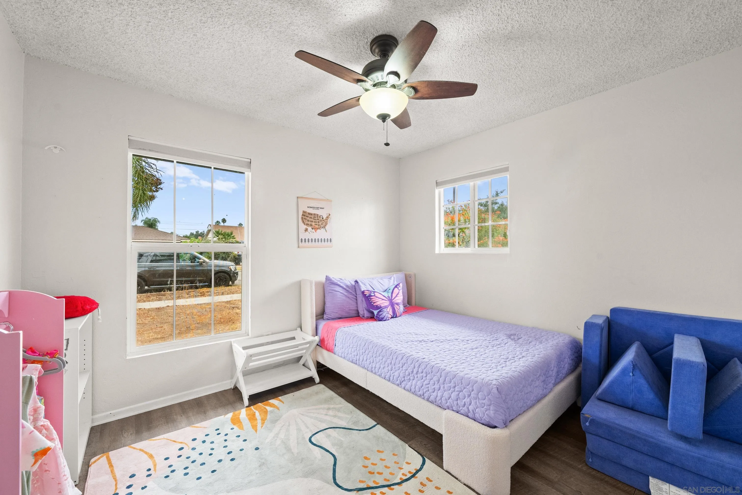 6656 Cathy Place Riverside, CA 92504 - Photo 28 of 49 a bedroom with a bed and a window