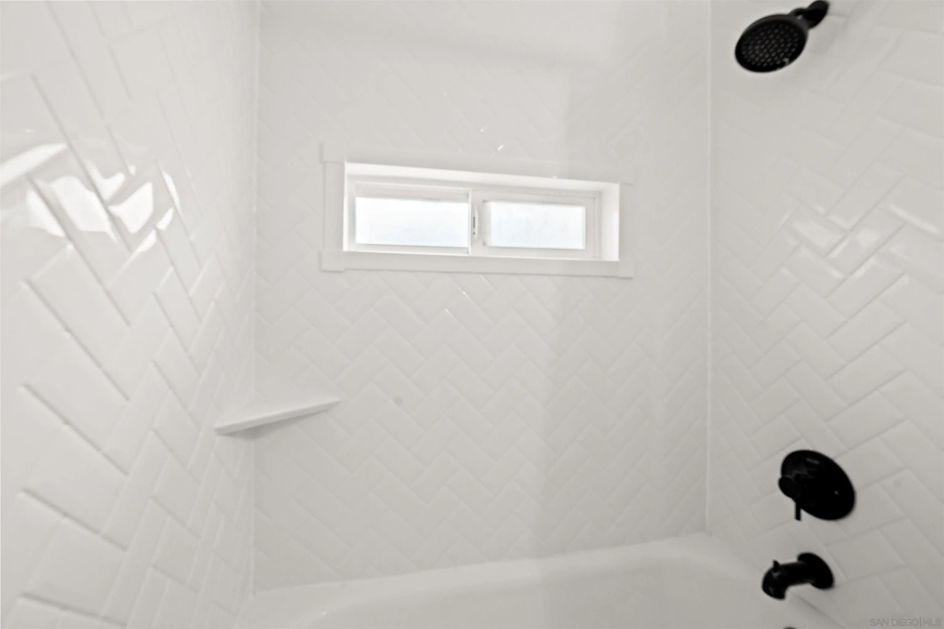 6656 Cathy Place Riverside, CA 92504 - Photo 34 of 49 a bathroom with a shower