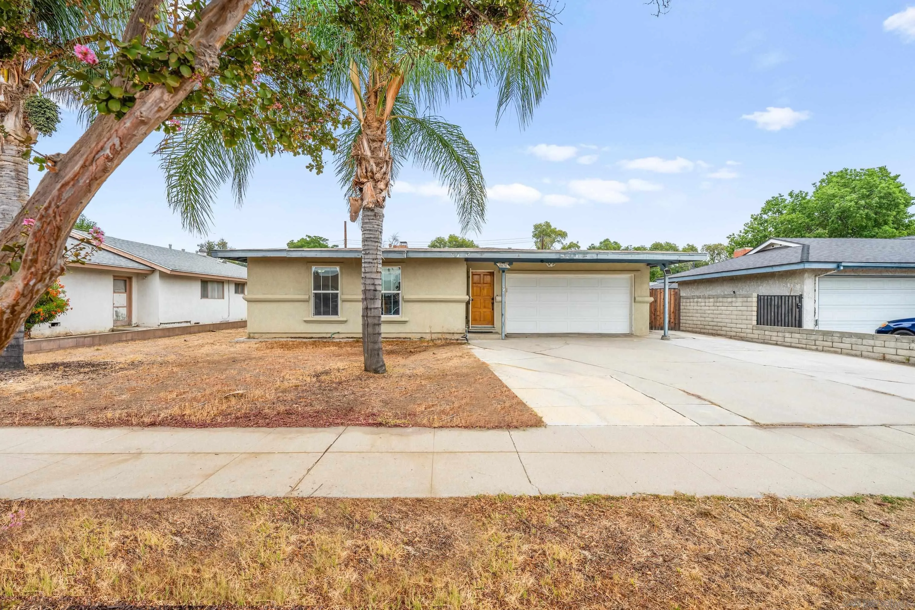 6656 Cathy Place Riverside, CA 92504 - Photo 7 of 49 front view of a house with a yard