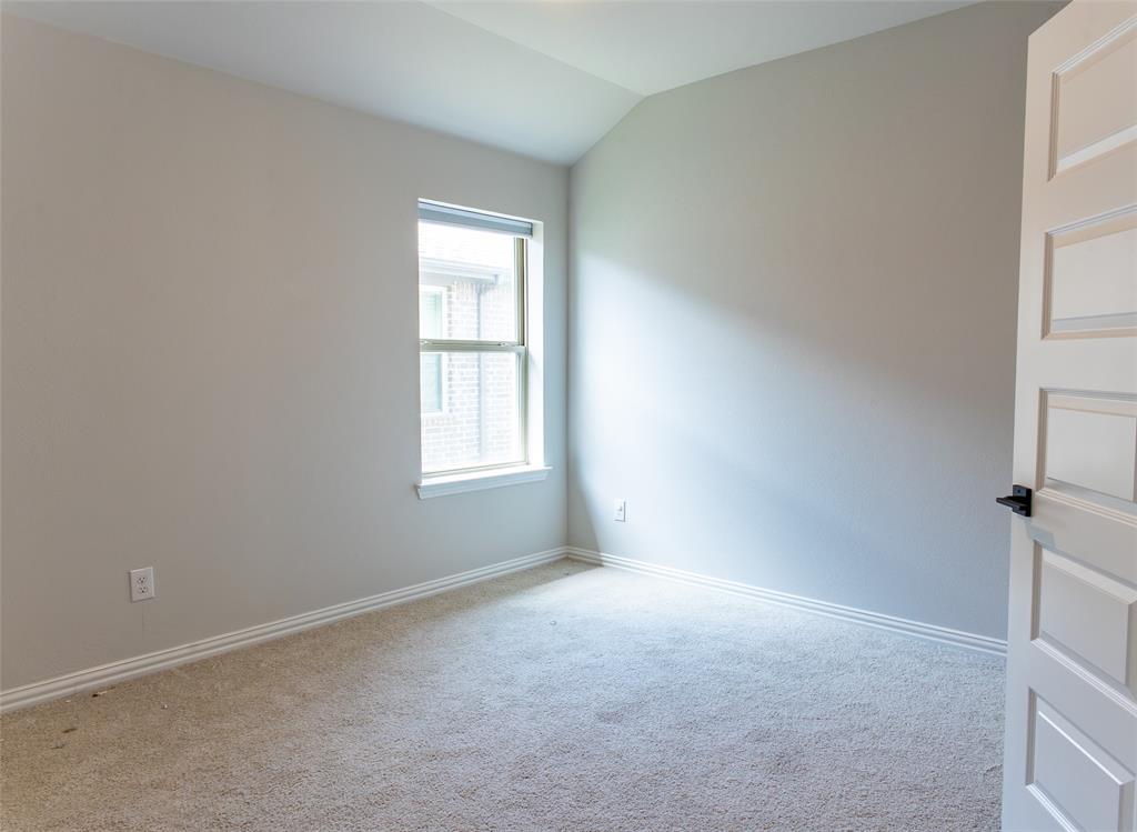 2604 Freeman Street Anna, TX 75409 - Photo 11 of 18 an empty room with windows