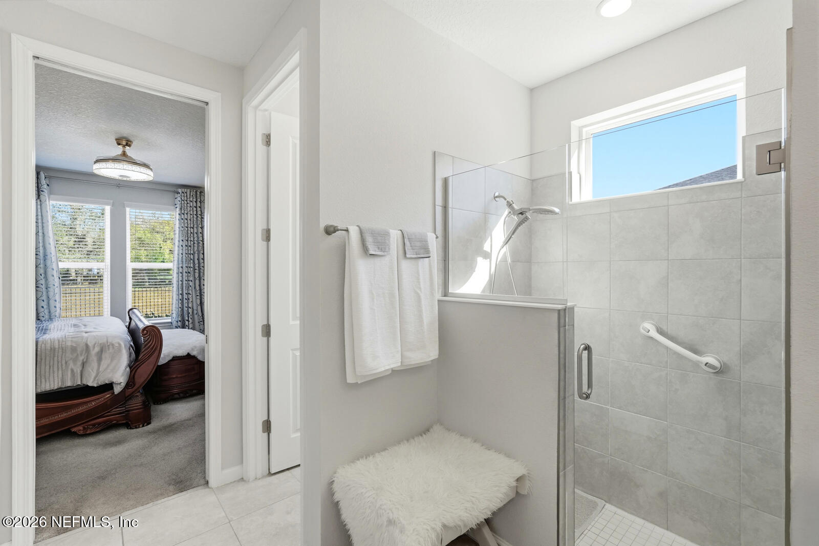 979 Rustic Ml Drive St. Augustine, FL 32092 - Photo 21 of 46 a bathroom with a sink and a mirror