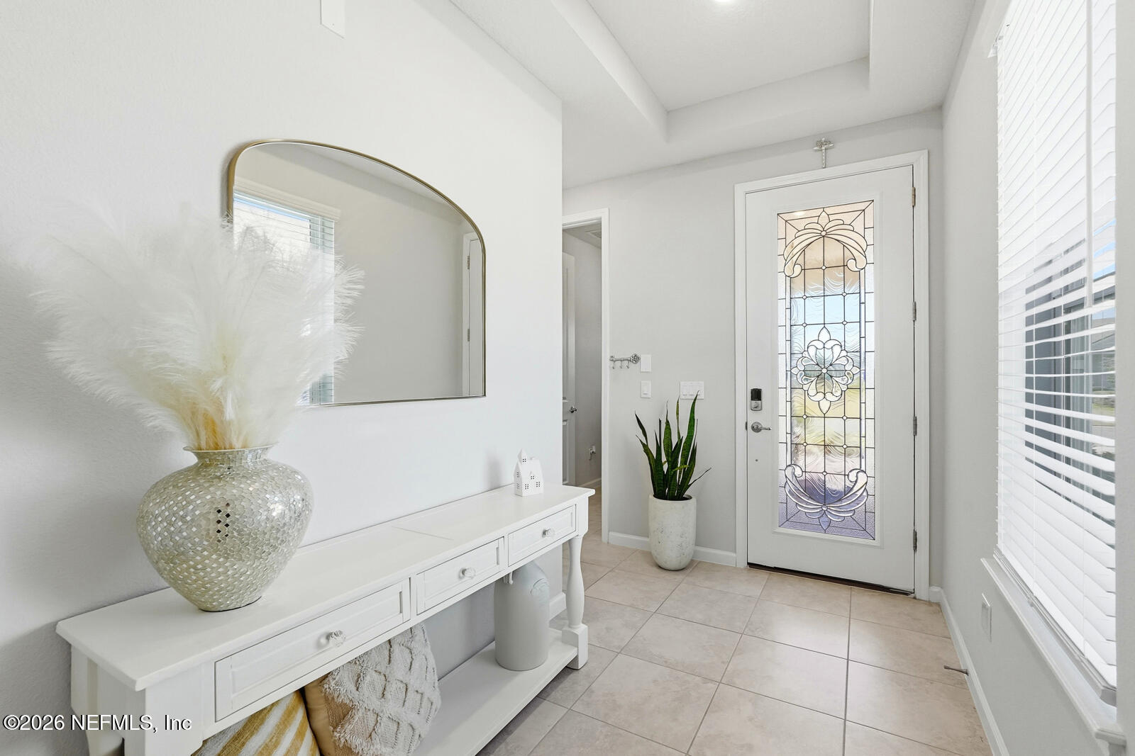 979 Rustic Ml Drive St. Augustine, FL 32092 - Photo 6 of 46 a living room with furniture and potted plant